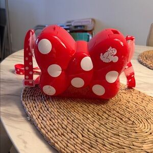 Disney Tokyo Red Polka Dot Bow-Shaped popcorn bucket.